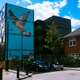 Colorful panels and murals make Hope Gardens more cheerful than other types of public housing.